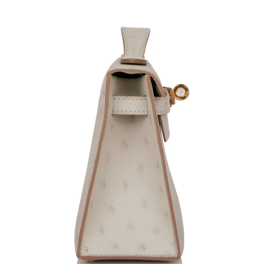 Off White Gris Perle Ostrich Grain Toggle Lock Mini Flap Hand Clutch